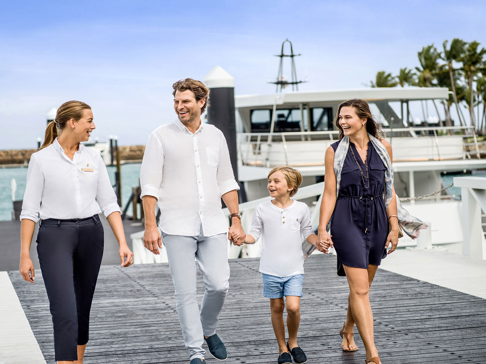 Family on wharf at Intercontinental Hayman Island